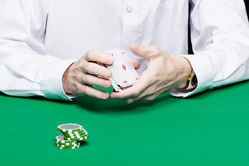 Image showing card player