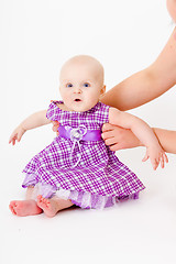 Image showing baby girl in a dress. studio