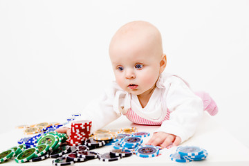 Image showing infant with chips from the casino