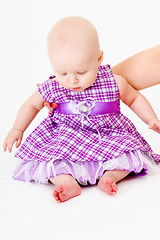 Image showing baby girl in a dress. studio