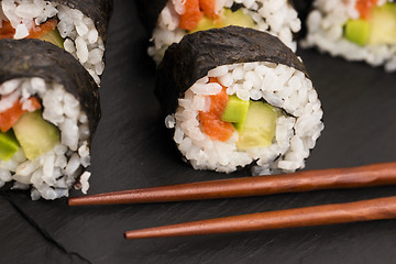 Image showing Salmon rolls served on a plate