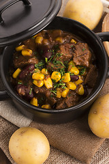 Image showing Tasty winter traditional hot pot stew with meat and vegetables 