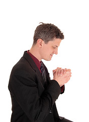 Image showing Praying businessman.