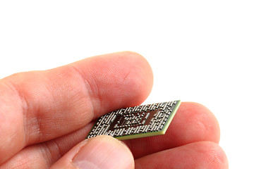 Image showing computer chip in the human hand 
