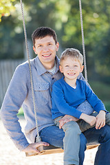 Image showing family at swings