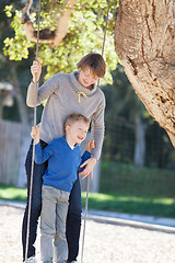 Image showing family at swings