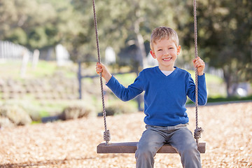 Image showing boy at swings