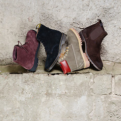 Image showing Set of man footwear on a grunge  background