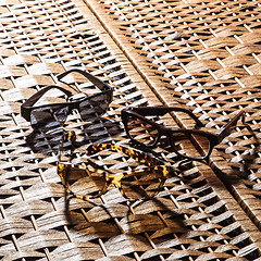 Image showing collection of colorful sunglasses on white background