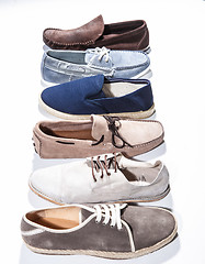 Image showing Set of man footwear on a white background