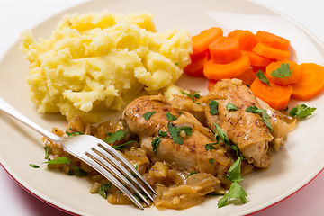 Image showing Chicken in almond sauce with fork