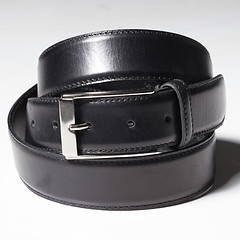 Image showing Black belt with a simple buckle on white background