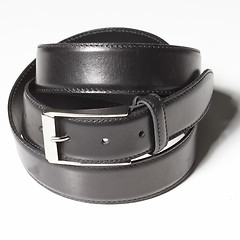 Image showing Black belt with a simple buckle on white background