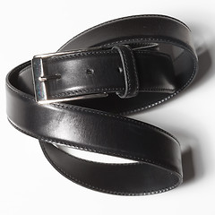 Image showing Black belt with a simple buckle on white background