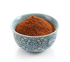 Image showing bowl of cinnamon powder