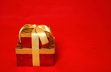 Image showing Wrapped present on a red background