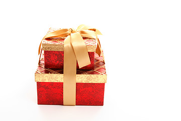Image showing Red and gold gift boxes