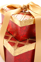 Image showing Red and gold gift closeup