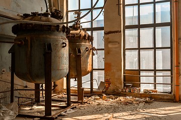 Image showing Industrial containers in abandoned interior