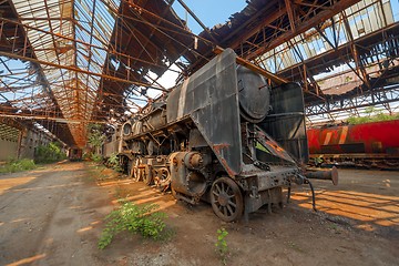 Image showing Cargo trains in old train depot