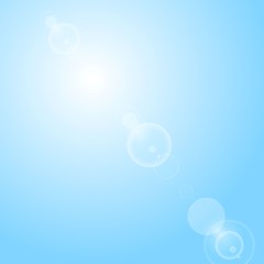 Image showing Shiny lens flare on blue sky