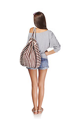 Image showing Back view girl with backpack