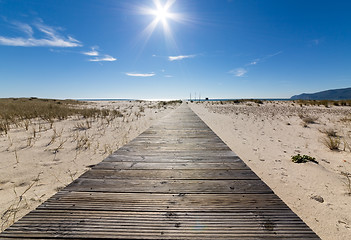 Image showing Wooden Walkway Leading to the Beach over Sand Dunes