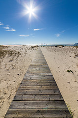 Image showing Wooden Walkway Leading to the Beach over Sand Dunes