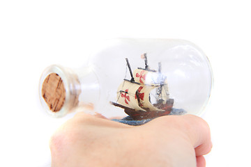 Image showing small ship in human hand