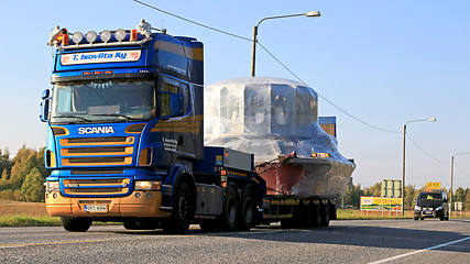 Image showing Scania R500 Hauls Wide Load Accompanied by an Escort Car