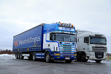 Image showing Scania 164L Topline and DAF Semi Trucks Parked