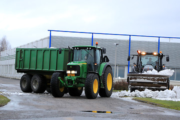 Image showing Winter Snow Removal with John Deere and Valtra Tractors