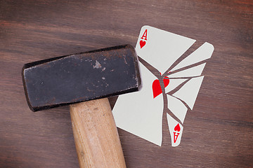 Image showing Hammer with a broken card, ace of hearts