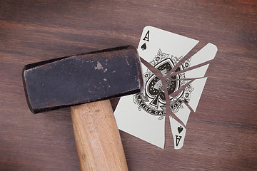 Image showing Hammer with a broken card, ace of spades