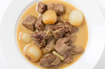 Image showing Lamb fricassee with onion from above