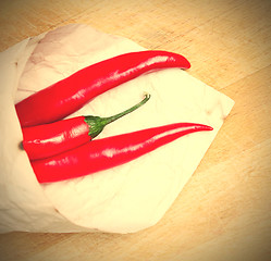 Image showing red hot chili peppers in paper bags