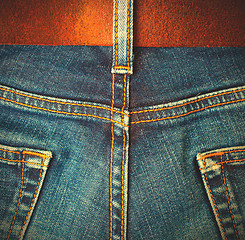 Image showing Aged jeans, back view