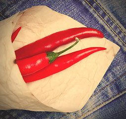 Image showing red hot chili peppers in paper bags