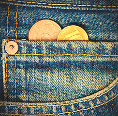 Image showing Coins in pocket jeans