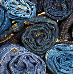 Image showing jeans trousers stack