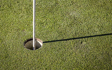 Image showing golf flag on green grass