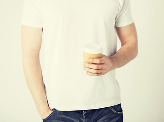 Image showing man hand holding take away coffee