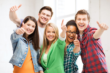 Image showing students showing thumbs up at school