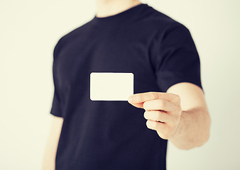 Image showing man hand with blank paper