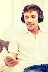 Image showing man with headphones listening to music