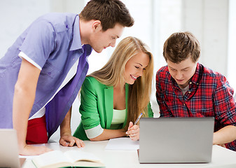 Image showing students writing test or exam in lecture at school