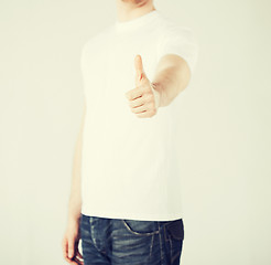 Image showing man showing thumbs up