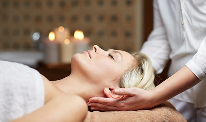 Image showing close up of woman having face massage in spa