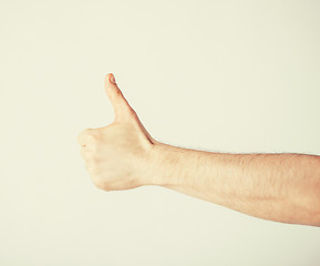 Image showing man showing thumbs up