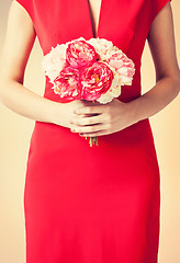 Image showing woman hands with bouquet of flowers